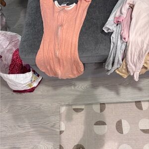 Baby clothing Mostly footie pajamas and onesis